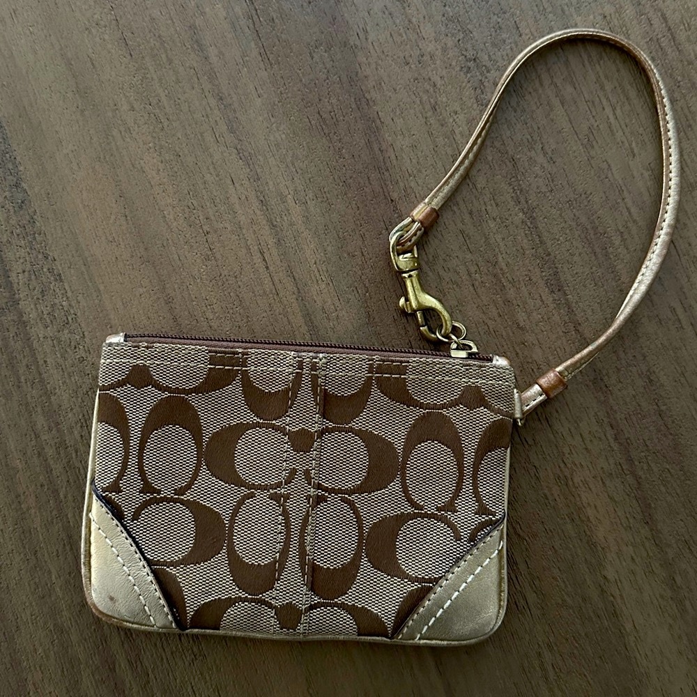 Coach Signature C Wristlet in Gold colour